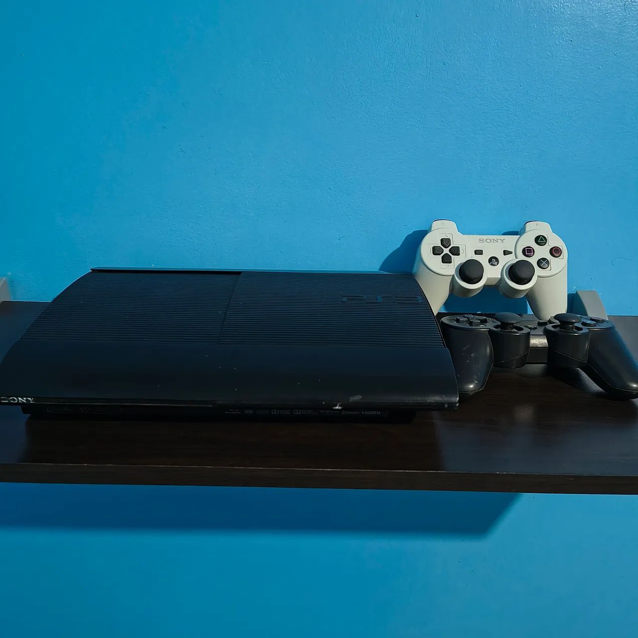 PS3 com dois controles e jogos - Foto 2