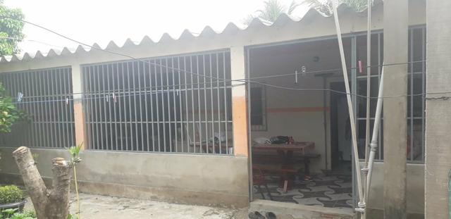 Vendo terreno com duas casas