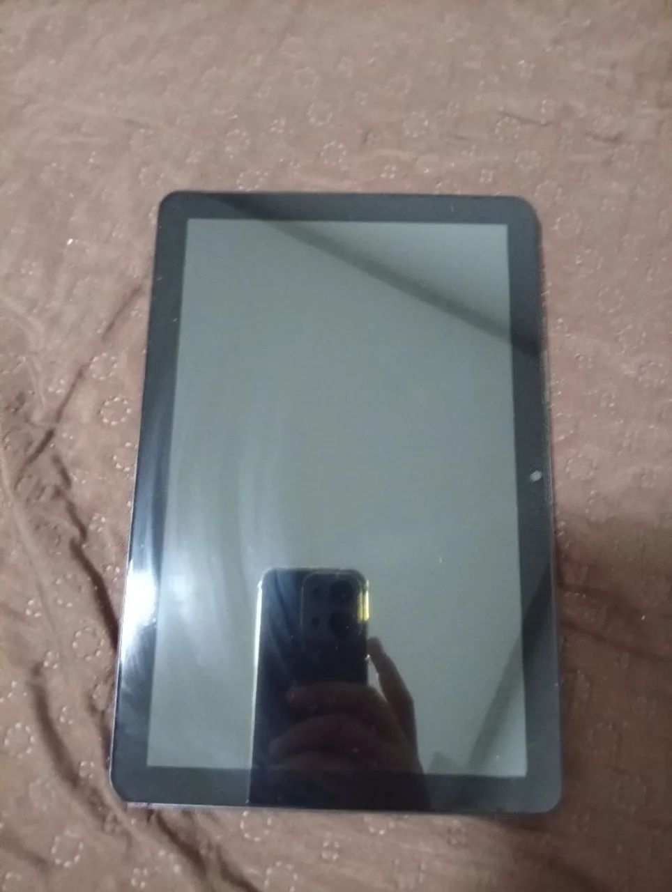 Tablet da atouch com ótima tela e capacidade pra tarefas 