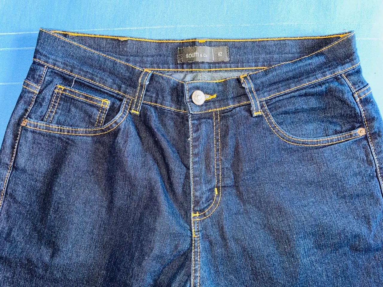 calça jeans escura - Foto 4