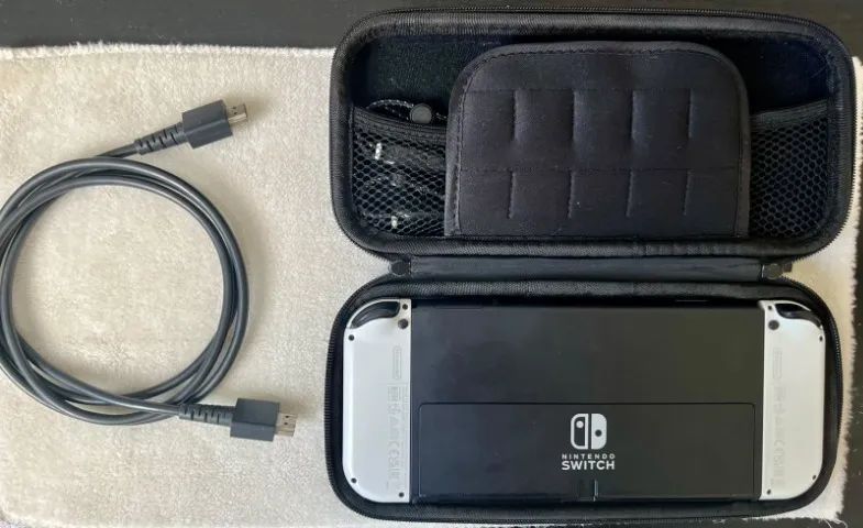 Nintendo Switch OLED 64GB Branco + Dock + Grip Skull & Co + Case - Foto 4