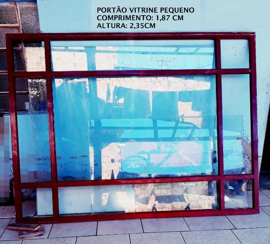 Portão vitrine semi novo barbada