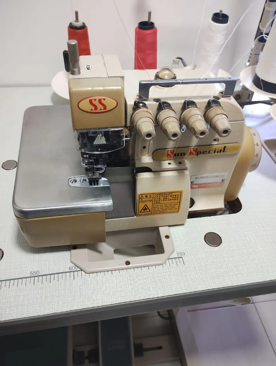 Máquina de costura industrial interlock