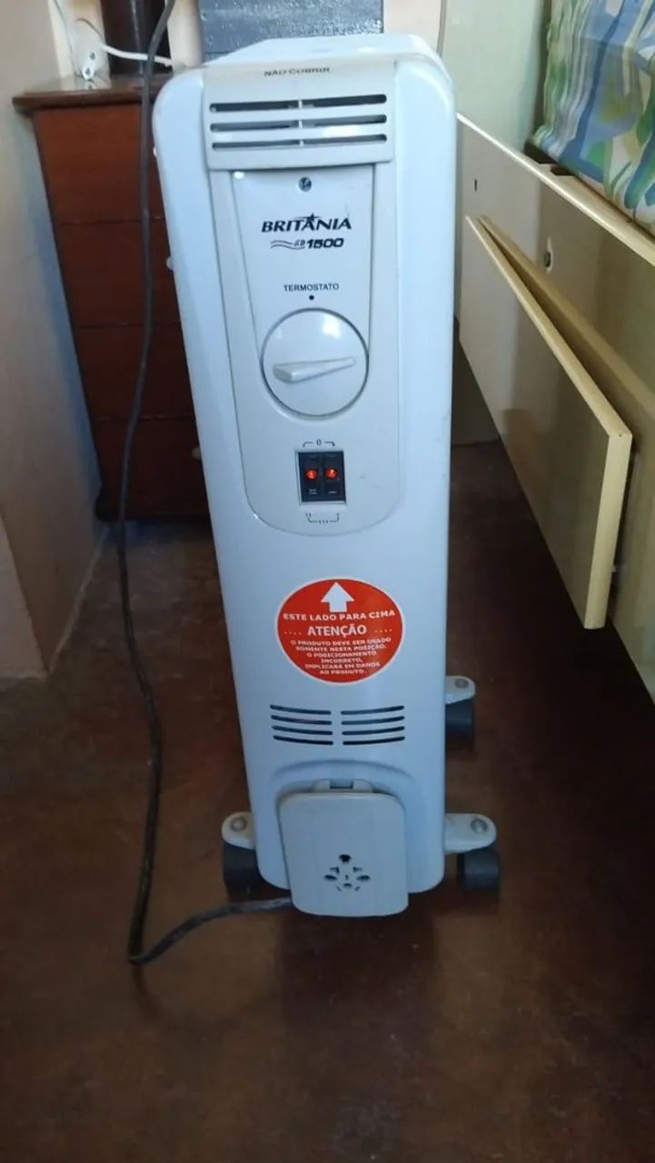Vendo aquecedor a óleo semi novo 150.00 - Foto 2