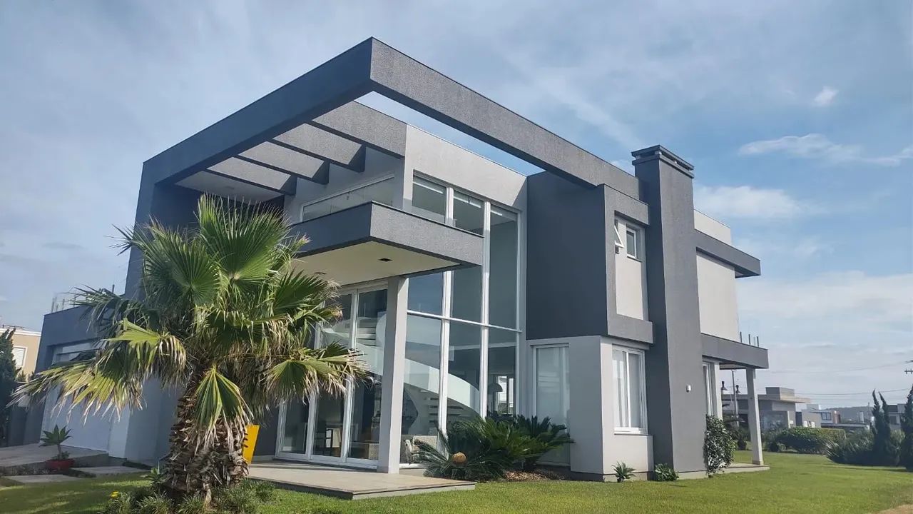 Sobrado à venda com 460 m2 e 5 suítes no Condominio Ocean Side - Torres RS
