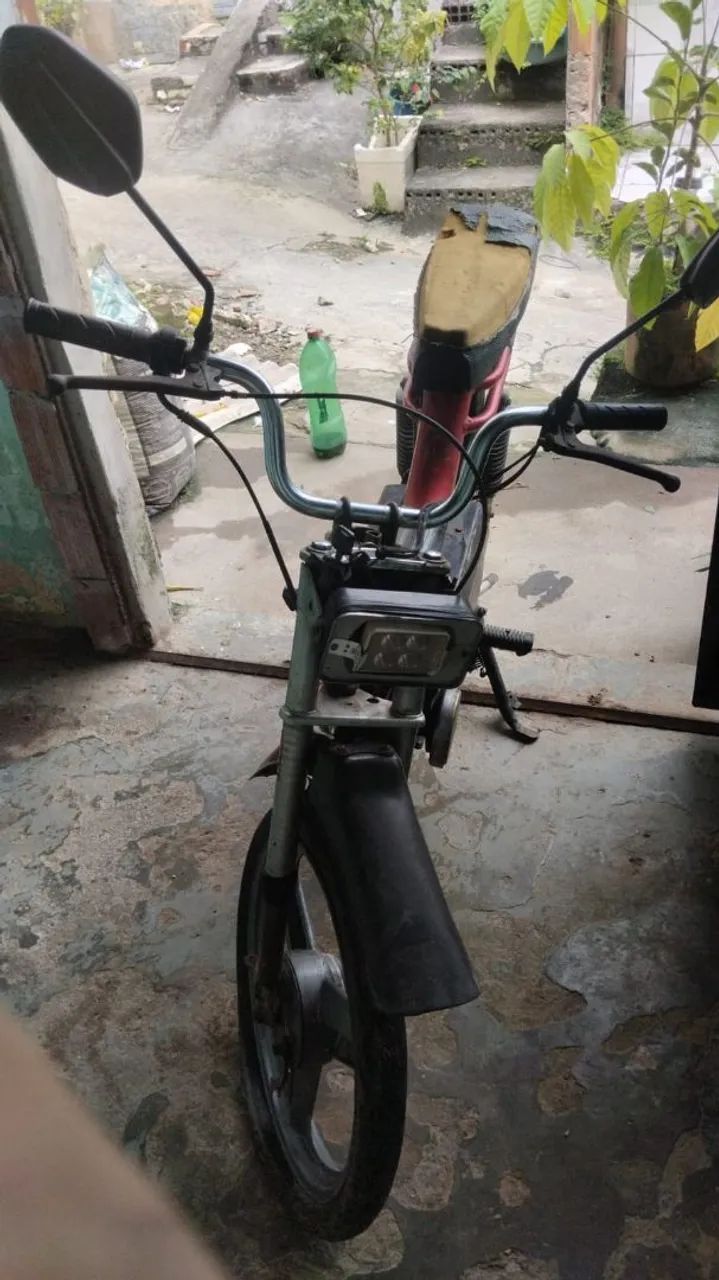 Bicicleta elétrica marca Caloi vermelha  - Foto 3