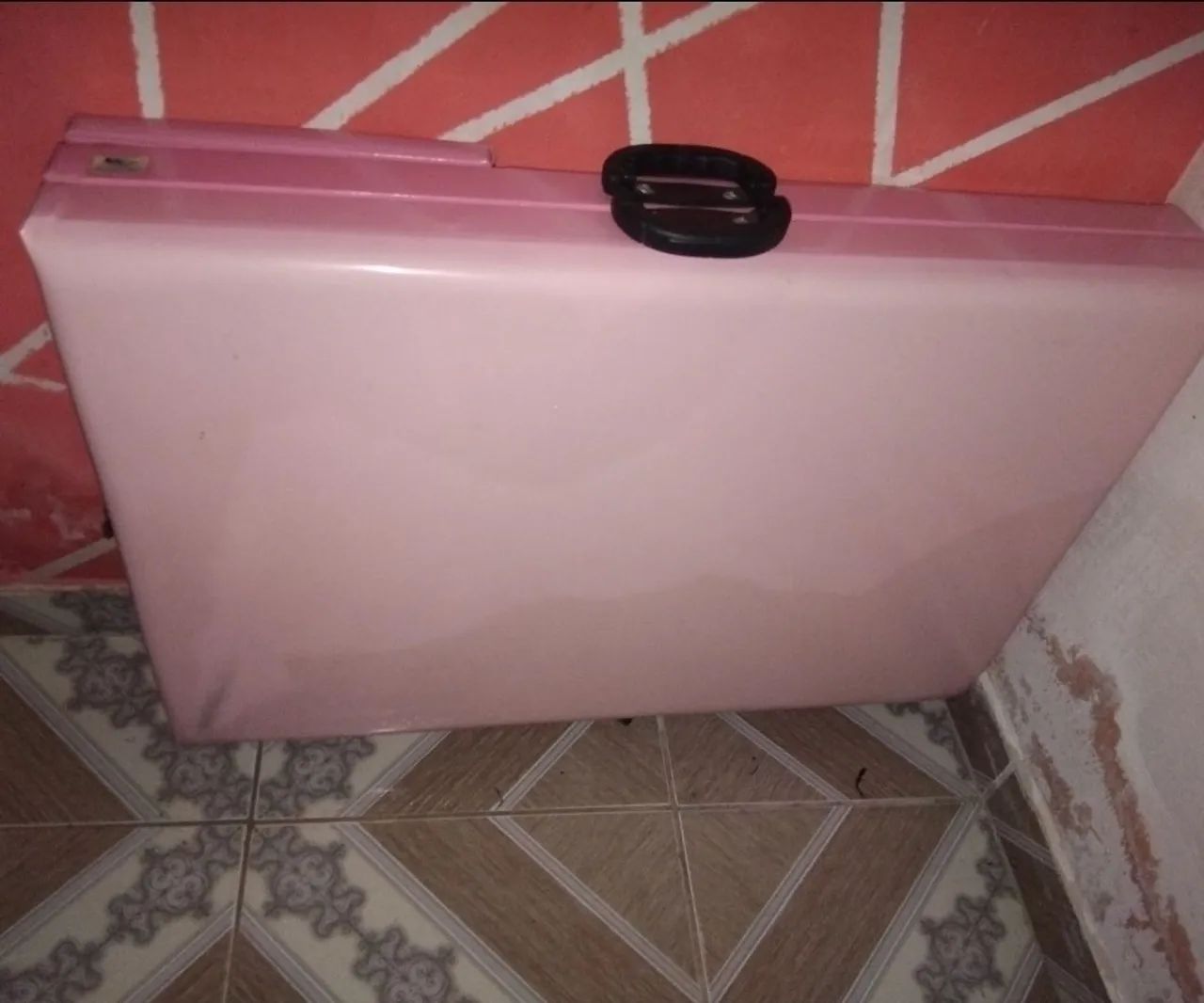 Maca para depilação cor rosa bebê.