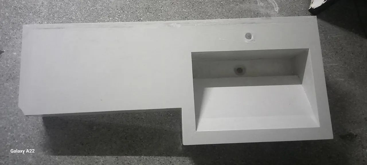 White marble sink. Only need to cut two small pieces, which will not interfere with anything.