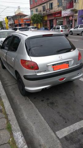 Peugeot top 2004 12mil leia