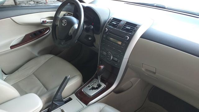 Corolla altis 2.0 2013 único dono - Foto 6