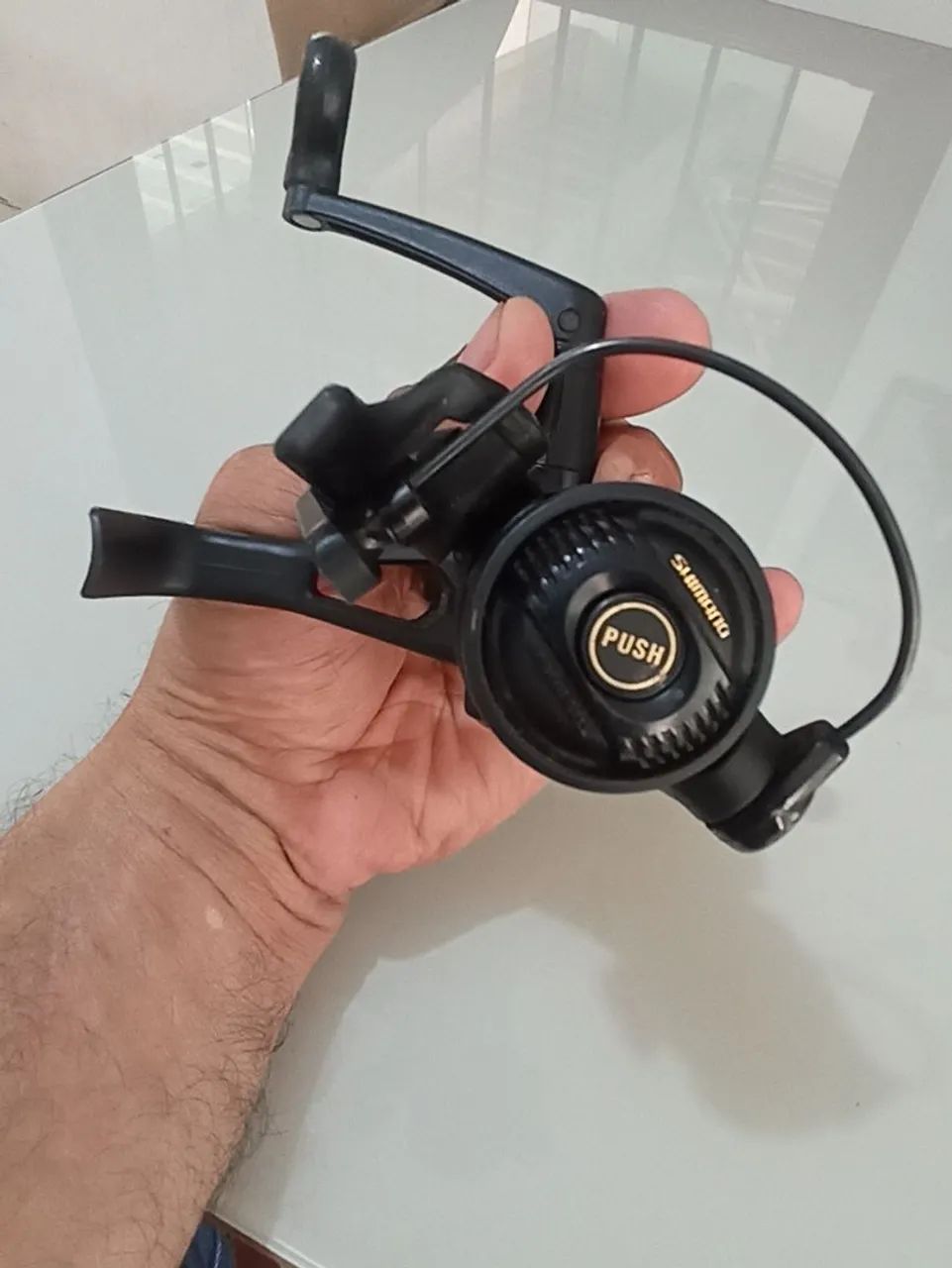 Molinete pesca Shimano micro Black Magnum - Foto 4