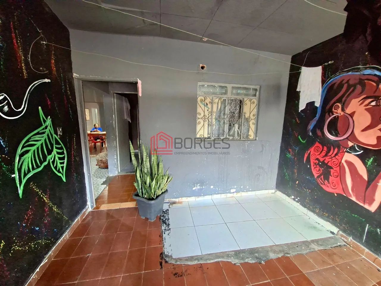 Casa Geminada com Ponto Comercial no Centro