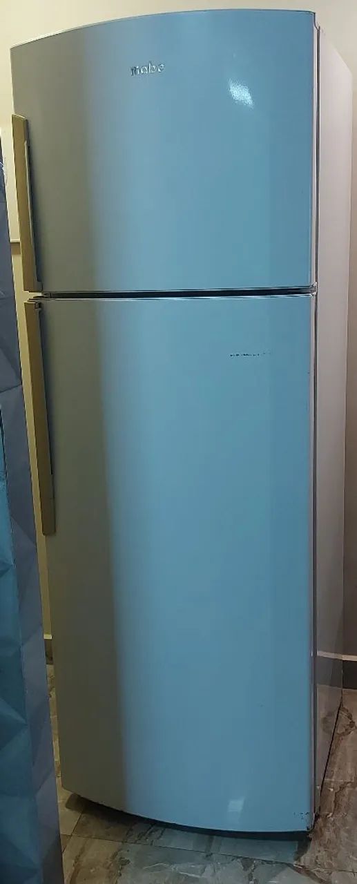 VENDO UMA GELADEIRA USADA, VOLTAGEM 127, CASI QUEIRA, LEVA JUNTO O TRANSFORMADOR . - Foto 2