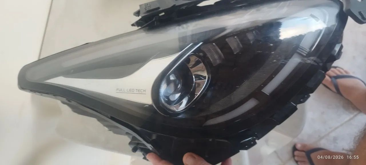 Farol Geely ex2