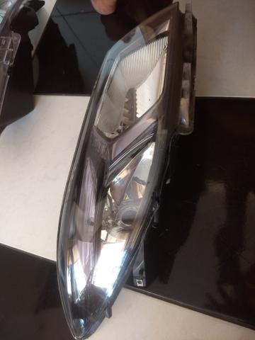 Vendo farol prisma /Onix 2019 usado original