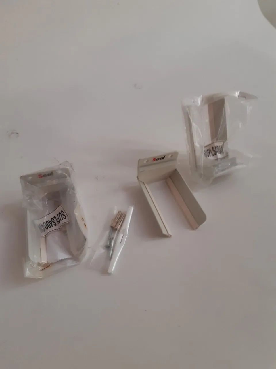 Suporte para leitor código barras.
