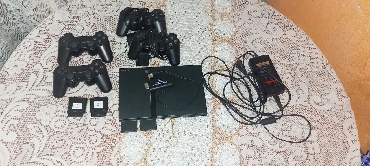 ps2 slim com 4 controles e 2 memory card 