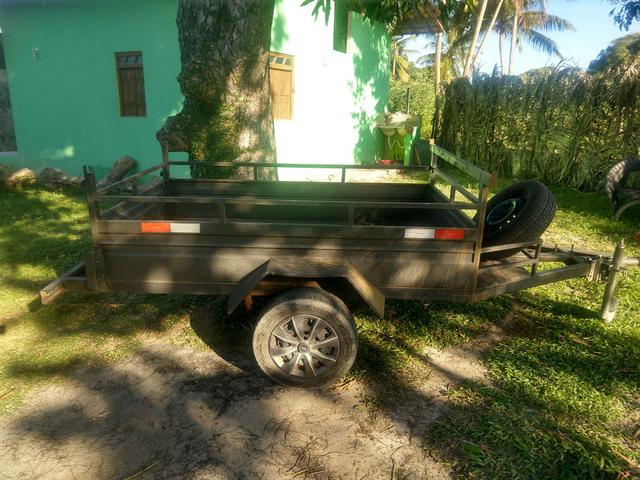 Vendo reboque carretinha, pneus novos com estepe - Foto 5