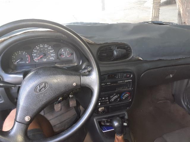 Carro muito bom valor negociavel troco por moto - Foto 5