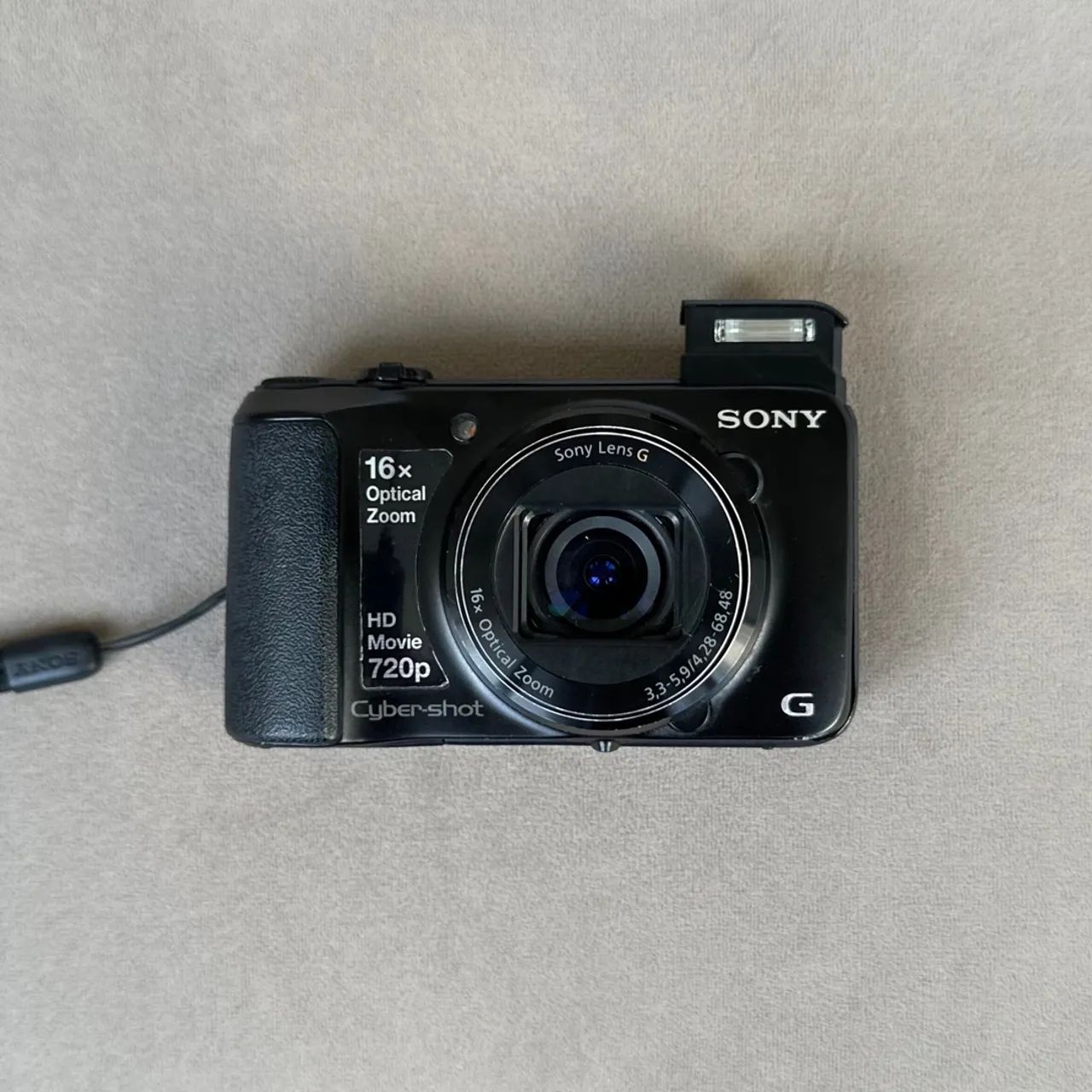 Câmera Digital Fotográfica Sony Cyber-shot DSC-H90 - 16.1 MP - Zoom Óptico 16x - Vídeo HD