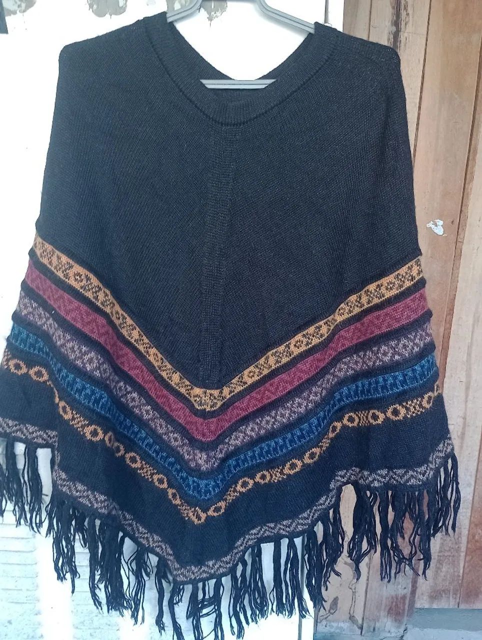 Poncho de tricô 