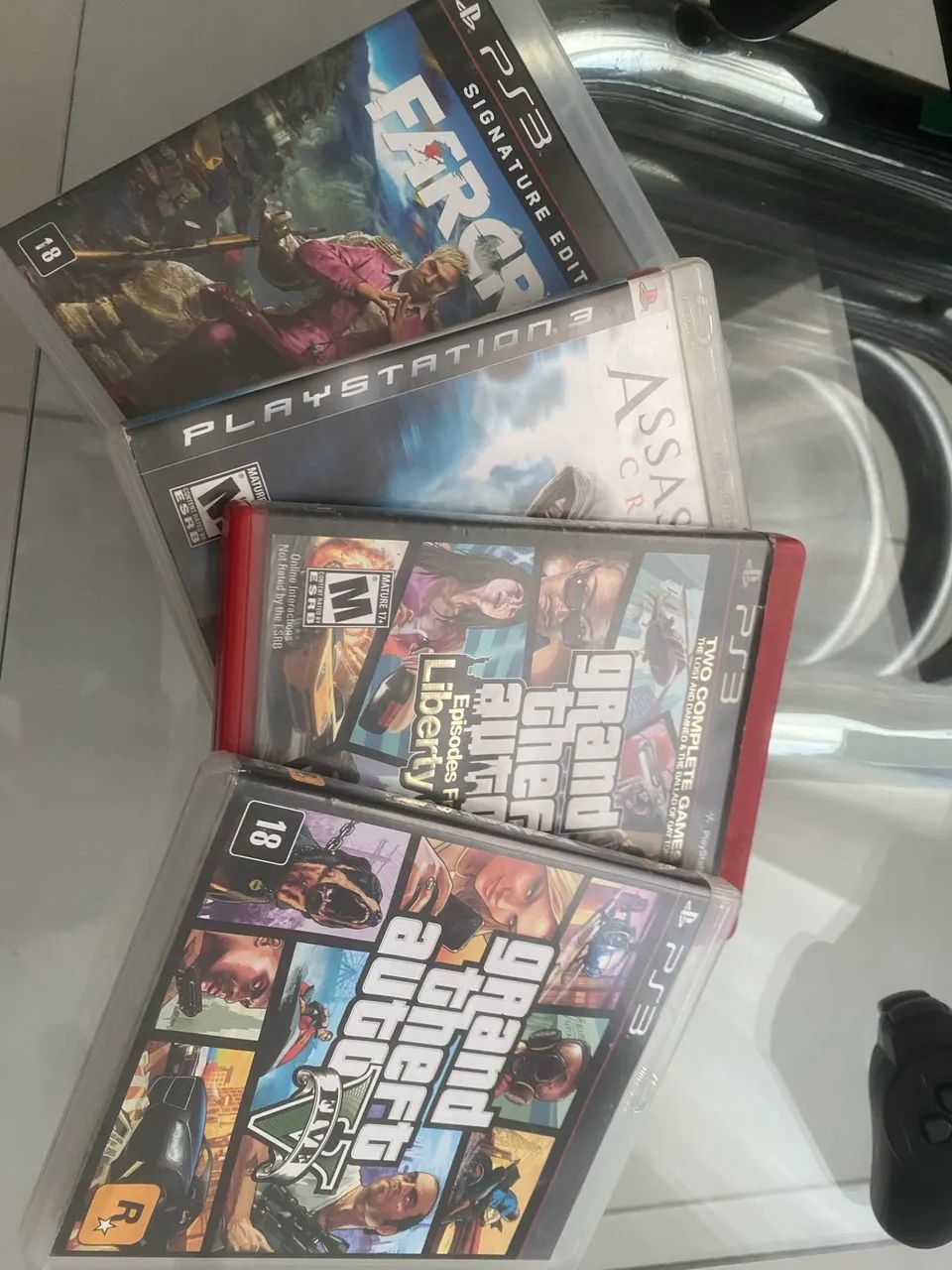 PS3 - com 7 jogos e 4 controles - Foto 4