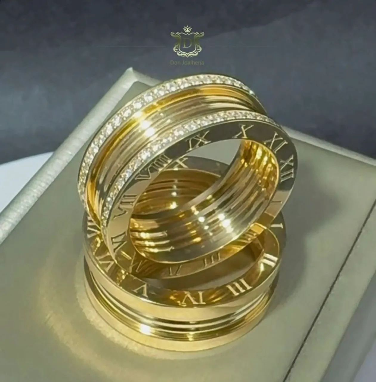 Par de alianças Romanas em Ouro 18k 750