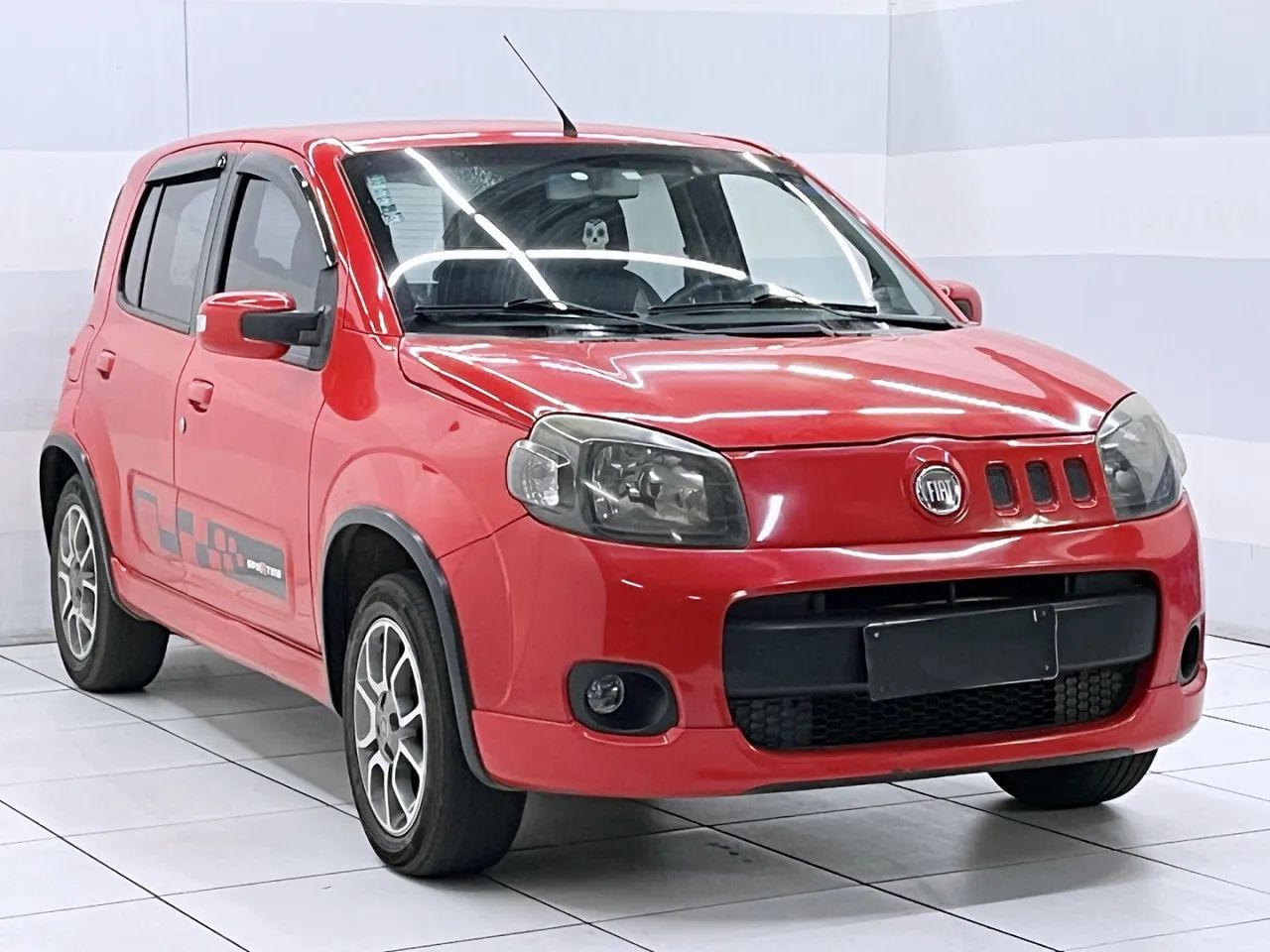 Fiat Uno Sporting 1.4 EVO Fire Flex 8V 4P 2012 - Foto 4