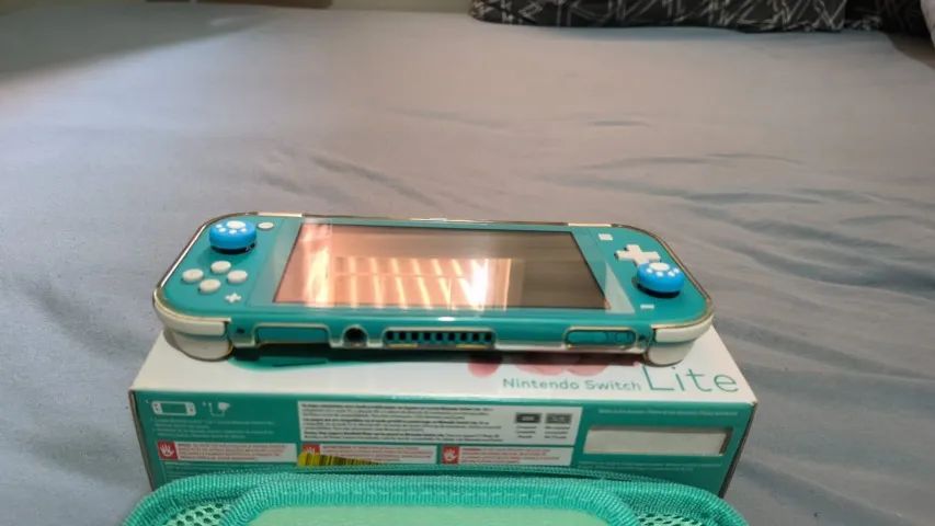 Nintendo Switch Lite Turquesa usado BLOQUEADO - Foto 4