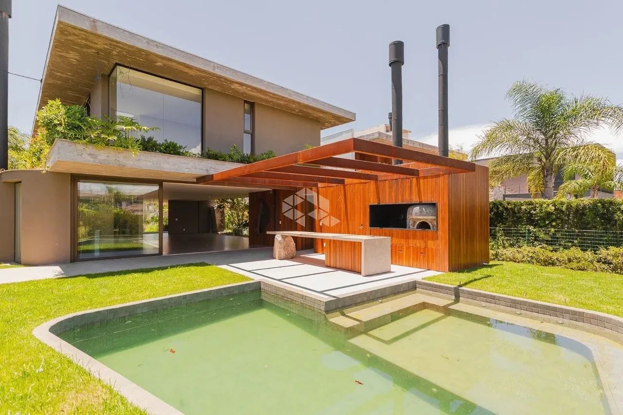 Casa para comprar no condomíno Ponta da Figueira com 5 suítes