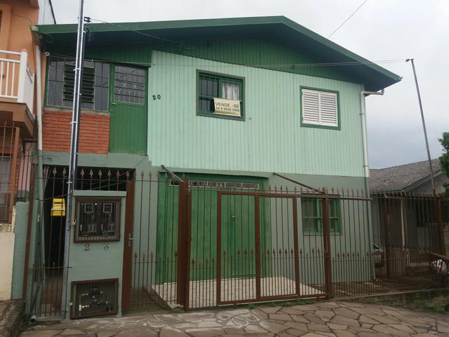 Terreno com 2 casas