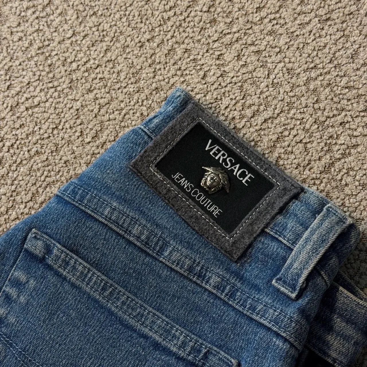 calça jeans versace jeans couture