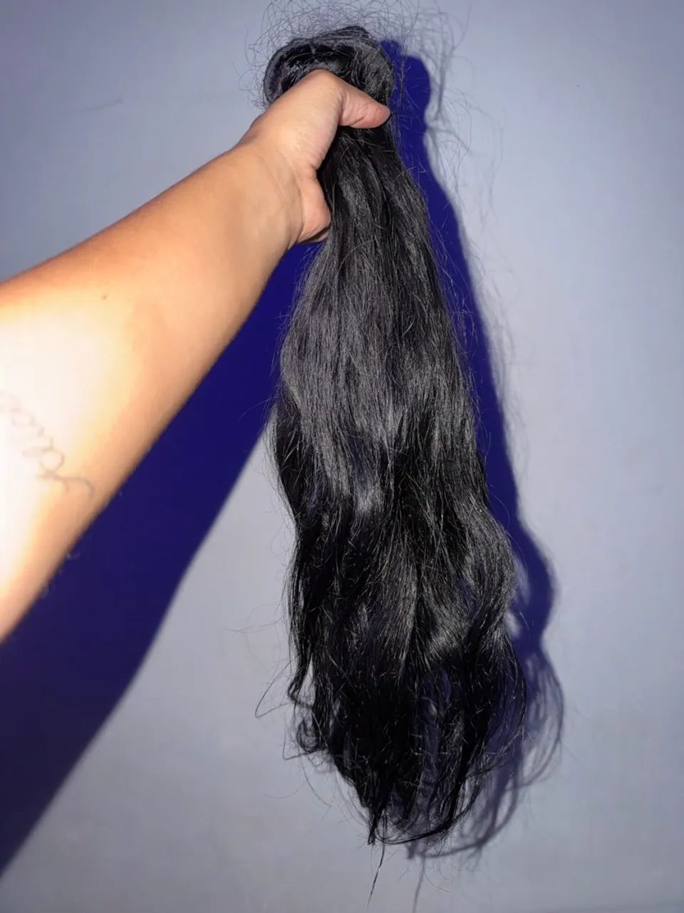 Cabelo humano no método ponto americano.
