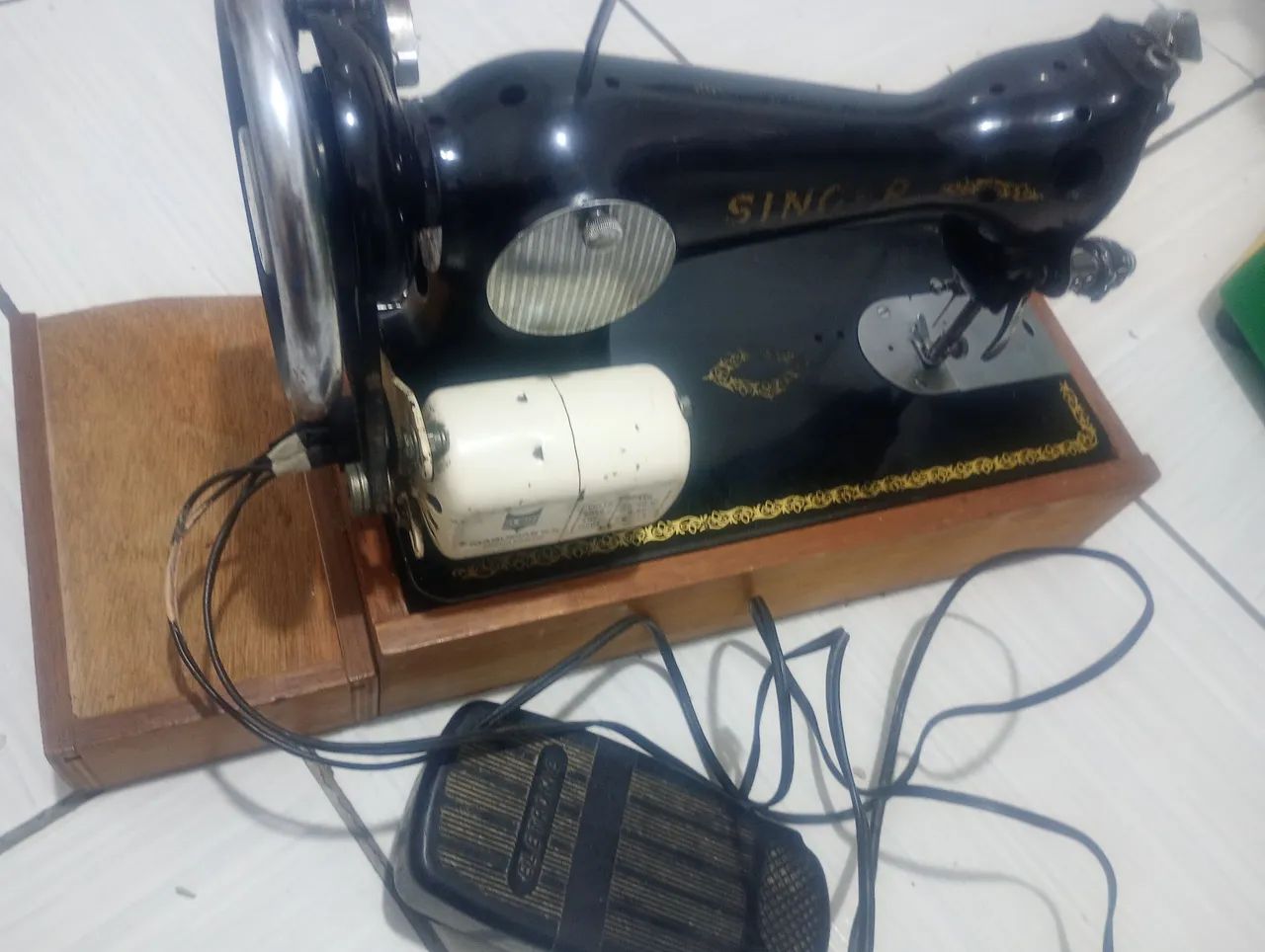 Máquina de costura singer
