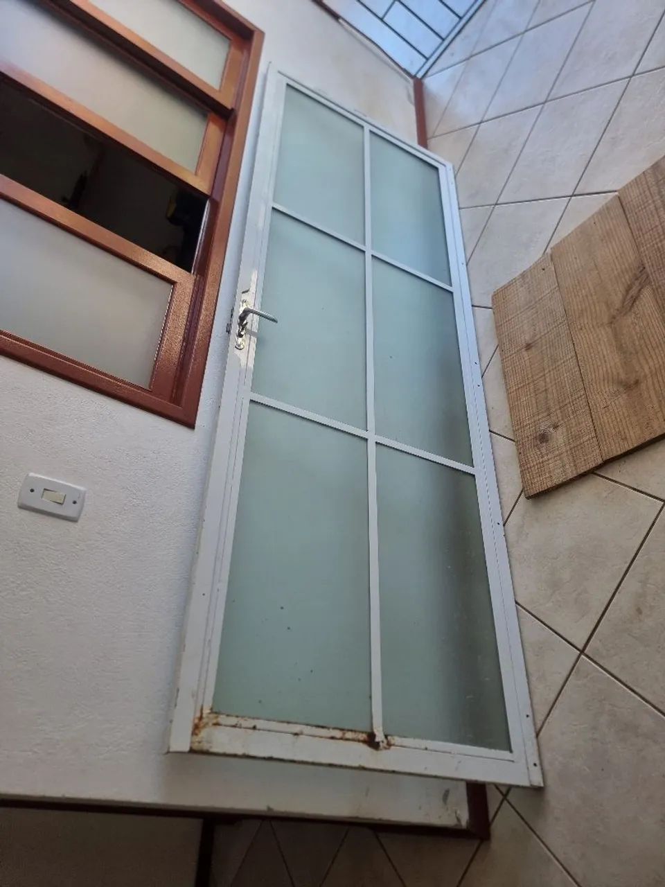 Portão de ferro com vidro