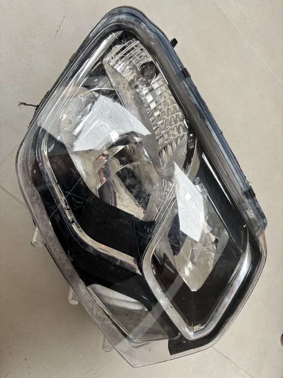 Lente Farol direto oroch 2021