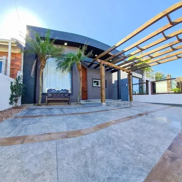 Fantástica casa 3 dormitórios, vista pro mar em Capão da Canoa