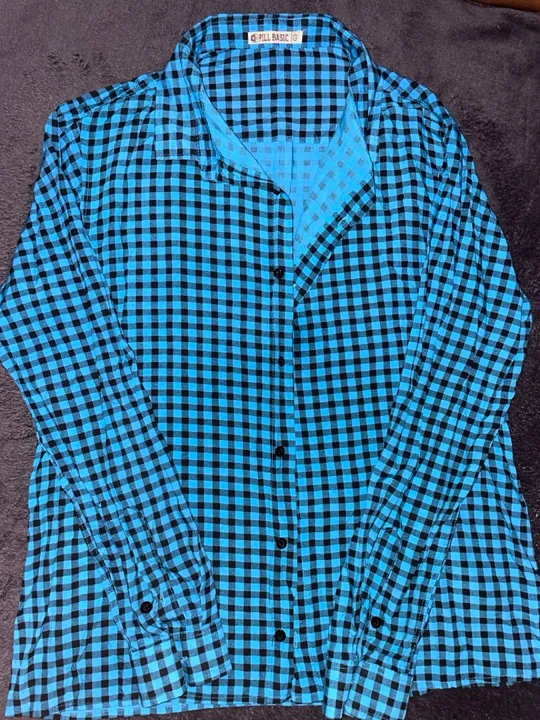 Camisa xadrez azul e preta