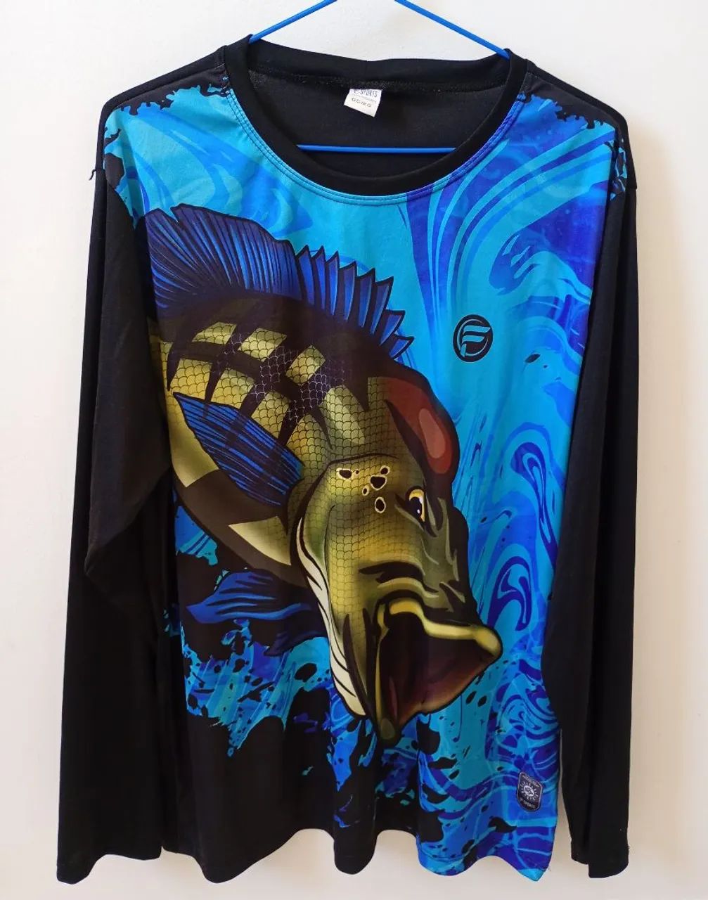 Camisa proteção solar GG por R$30