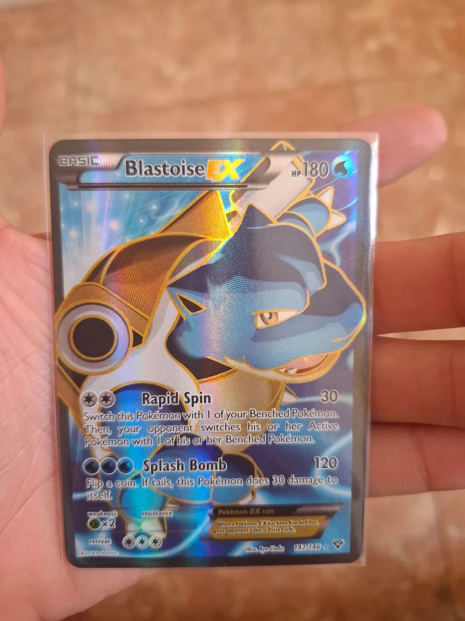 Carta Pokémon Blastoise-EX (142/146) ENG
