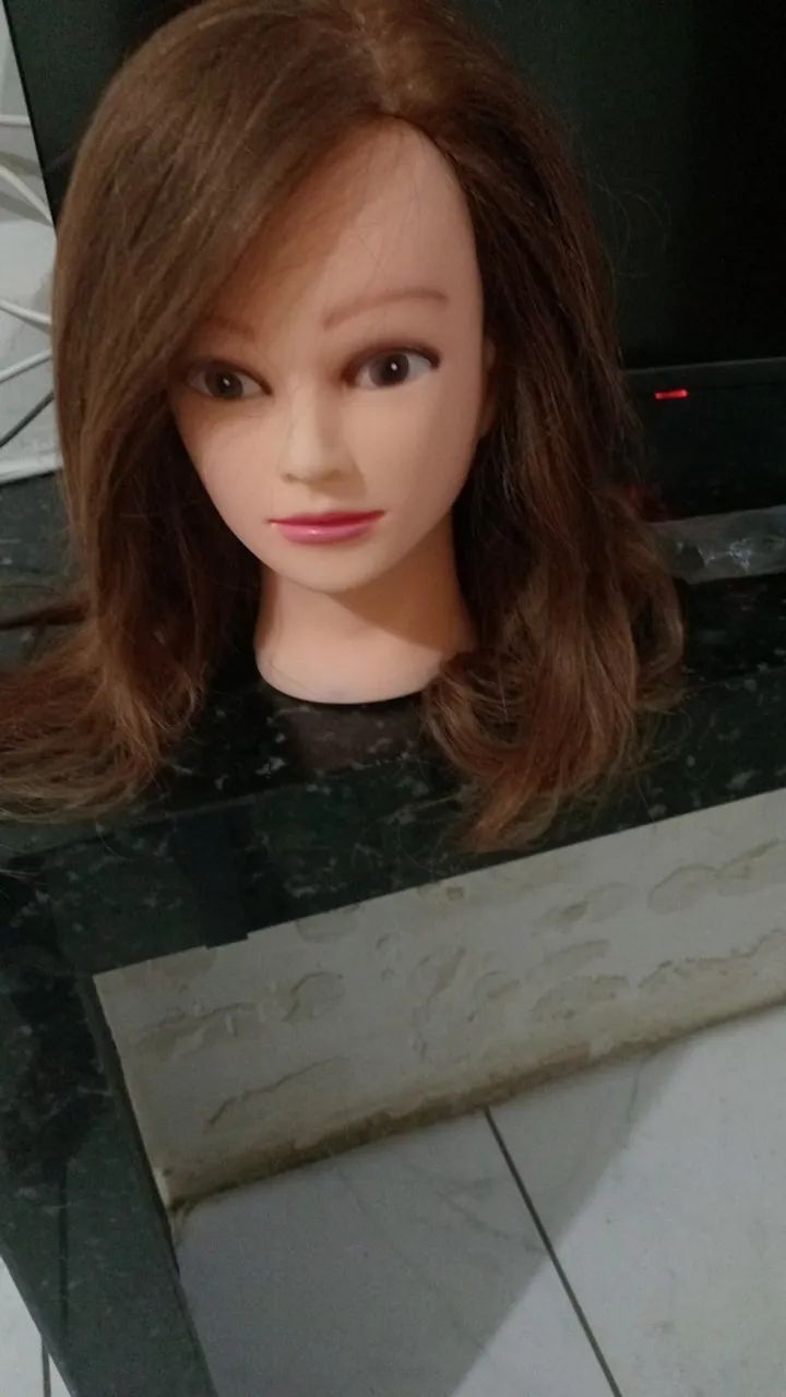 Cabeça de boneca para treino