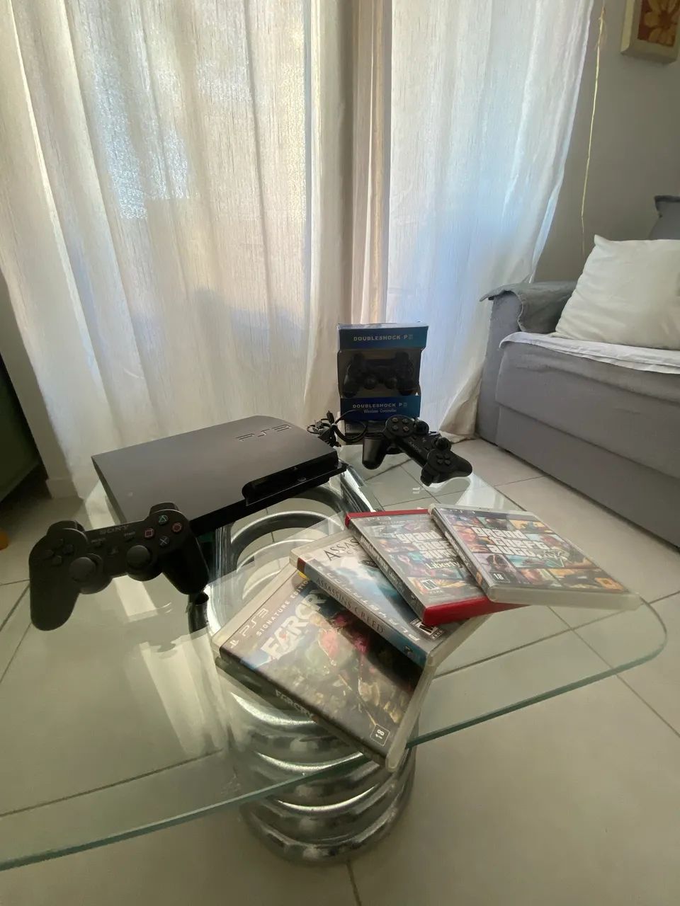 PS3 - com 7 jogos e 4 controles - Foto 5