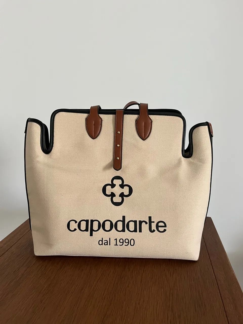 Bolsa Capodarte. Lona e couro.