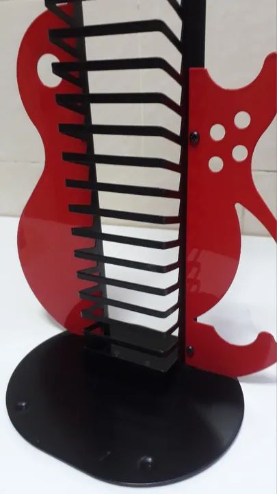 Porta CD`s em formato de Guitarra .