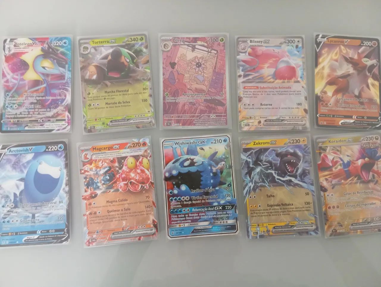 10 cartas pokémon com EX, GX,V, VMAX,e ilustração rara 