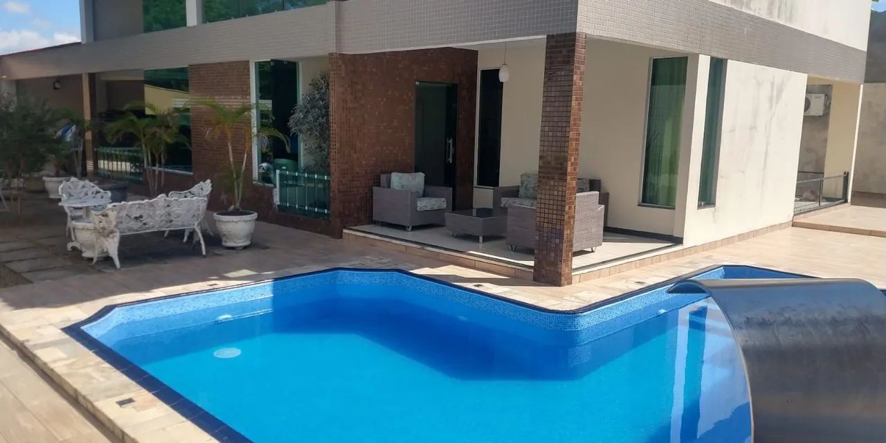 //Casa no Parque das Laranjeiras com piscina e 4 Qrts 