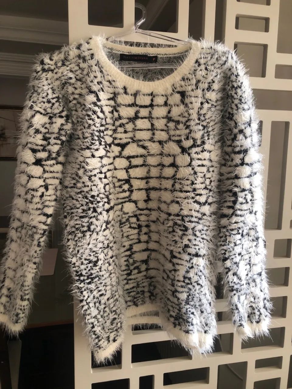Suéter animal print peludo