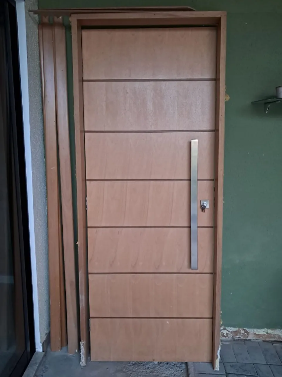 Porta de madeira Tauari abertura lado direito