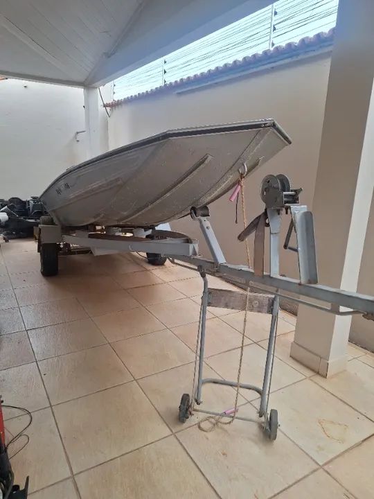 Barco metalglass big fish 5 metros com carreta e motor mercury 25 hp seapro