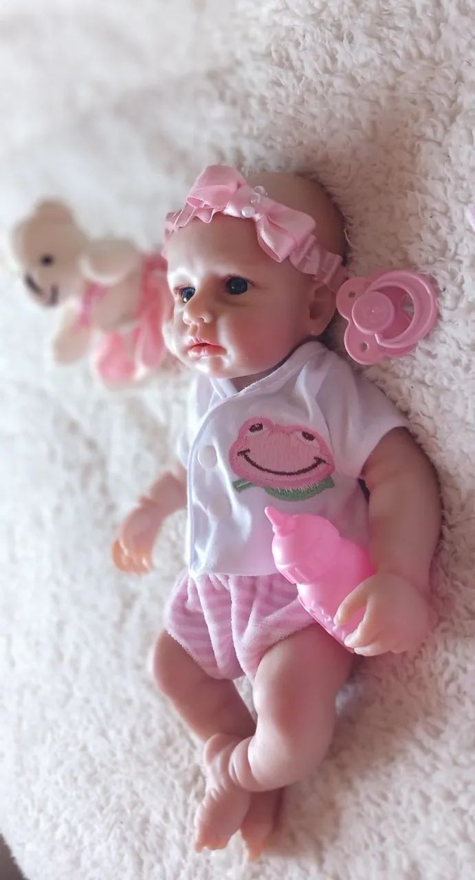 Boneca Reborn Toda  de Silicone Sólido 35 cm. - Foto 5